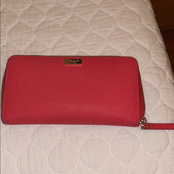kate spade Handbags - Kate Spade Coral Zip Around Wallet